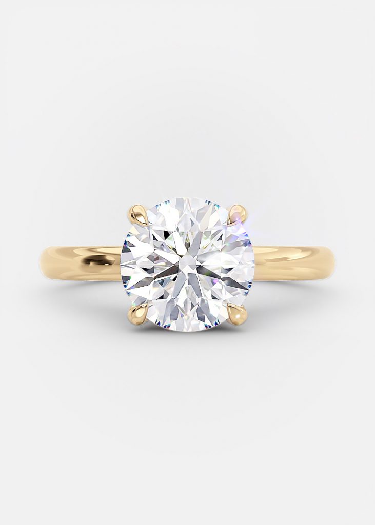 Isa 1.3 Ct round cut engagement ring